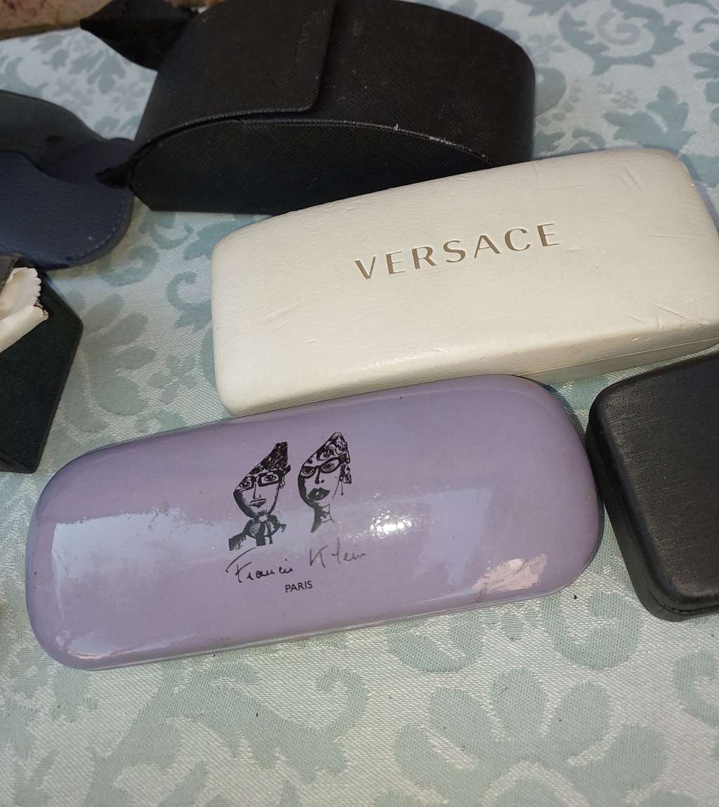 A COLLECTION OF VINTAGE SPECTACLES AND CASES