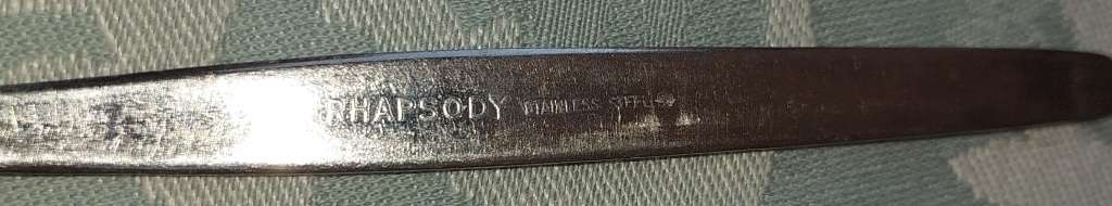 A COLLECTION OF 9 RHAPSADY SPOON