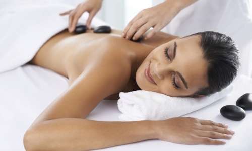 30 Minute Hot Stone Massage and a Deluxe Pedi or Mani for two people