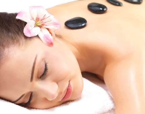 30 Minute Hot Stone Massage and a Deluxe Pedi or Mani for two people