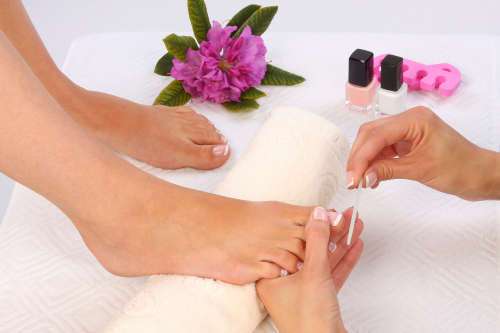 30 Minute Hot Stone Massage and a Deluxe Pedi or Mani for two people
