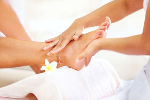 30 Minute Hot Stone Massage and a Deluxe Pedi or Mani for two people