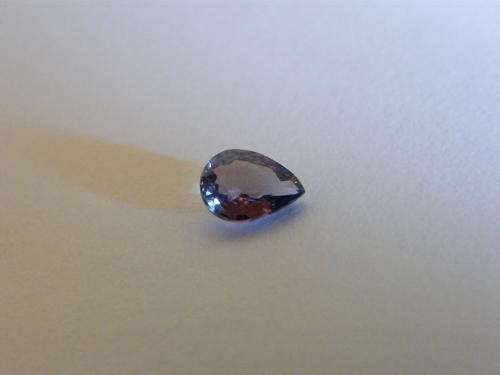 A STUNNING VIOLET BLUE IF.86 CT PEAR SHAPE TANZANITE WITH VALUATION CERTIFICATE.