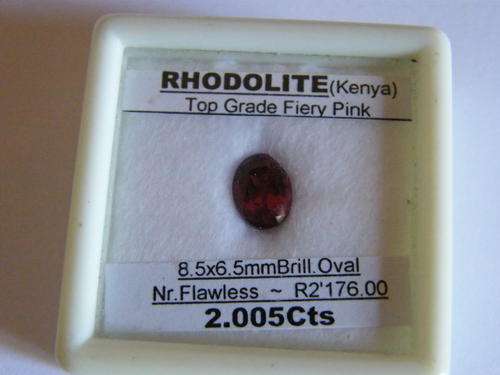 A 2.005cts BRILLIANT OVAL FACET, TOP GRADE FIERY PINK, RHODOLITE!!!  WITH CERTIFICATE!!!