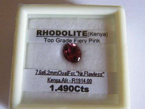 A 1.490cts OVAL FACET, TOP GRADE FIERY PINK, RHODOLITE!!!  WITH CERTIFICATE!!!
