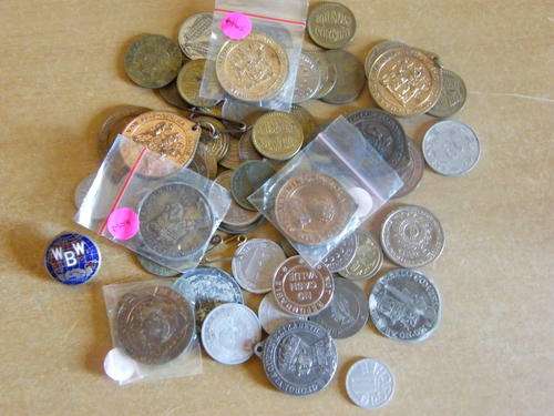 A LOT OF 60 MEDALS,TOKENS A BUTTEN AND SOME COINS.UNRECEARCHED AS I DONT COLLECT THESE ITEMS.