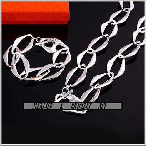 THIS IS A ABSOLUTELY BEAUTIFUL SILVER -   NECKLACE WITH BRACELET SET STAMPED 925 - MUST BID!