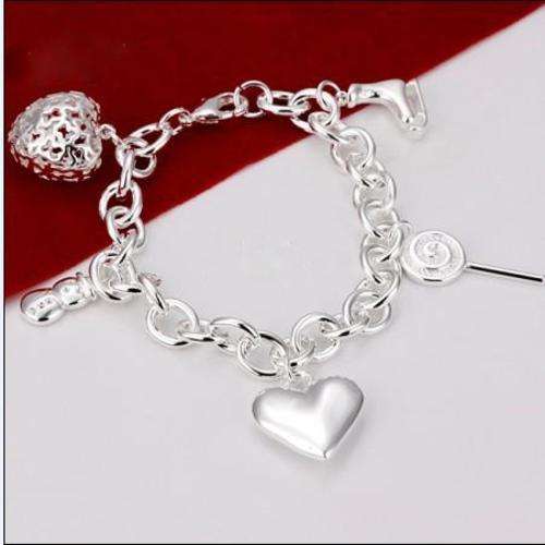 NEW! CHARM  SILVER BRACELET STAMPED 925. BEAUTIFUL!     NEVER BEFORE FOR R1-00!!!!