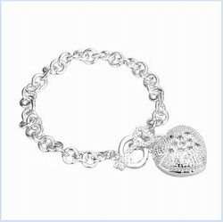 NEW STOCK... FIRST TIME EVER ON R1 AUCTION - CHARM SILVER BRACELET!   NEVER BEFORE FOR R1-00!!!!