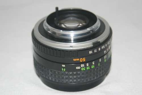 MINOLTA  MC  ROKKOR - PF  1:1.7  f= 50mm  FILM CAMERA LENSE.