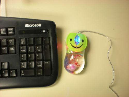 Digital, funky, colourful, flashing usb mouse