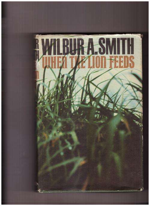 WHEN THE LION FEEDS BY WILBUR SMITH
