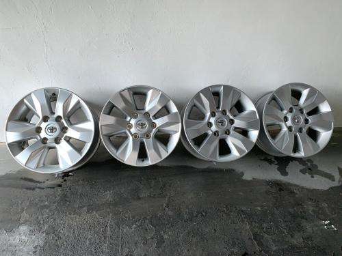 4 x ORIGINAL 17`` Hilux Mags (including 24 wheel studs)