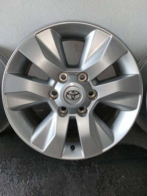 4 x ORIGINAL 17`` Hilux Mags (including 24 wheel studs)