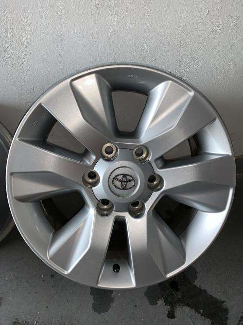 4 x ORIGINAL 17`` Hilux Mags (including 24 wheel studs)