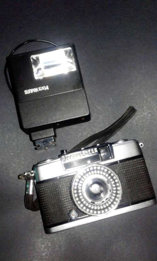 Vintage Olimpus Camera with Flash