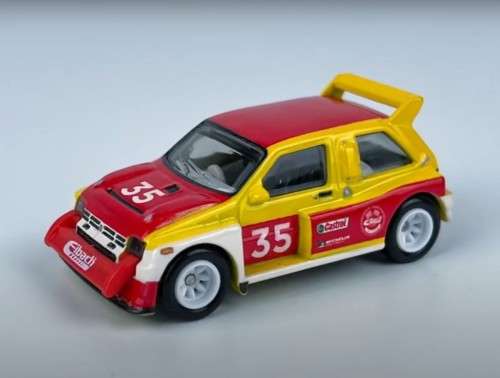 HOT WHEELS PREMIUM `TEAM TRANSPORTER` MG METRO 6R4 WITH HW RALLY HAULER