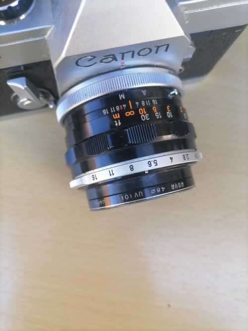 1966 The Canon FT QL is a 35mm single-lens reflex camera, Cannon Lens, Komura Lens, Speed light CASE