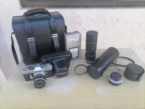 1966 The Canon FT QL is a 35mm single-lens reflex camera, Cannon Lens, Komura Lens, Speed light CASE