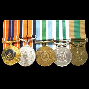 A grouping of Five Medals mounted on a Bar - Numbered - Presented to Sargent Major Buys (Jnr.).