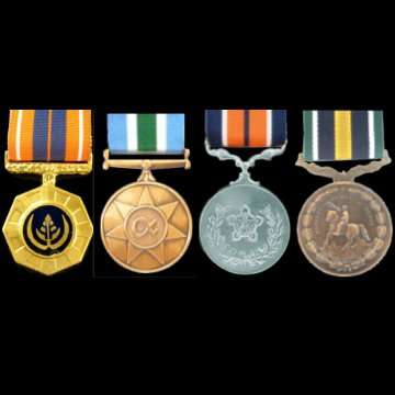 4 S.A. Medals with Ribbons - Border War Period - Numbered.