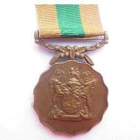 S.A.D.F. 10 year Miniature Good Service Medal (Bronze) with Ribbon.