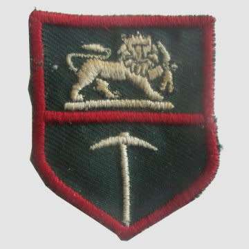 Rhodesian Army - White Embroidered On Green Backing With Red Border.