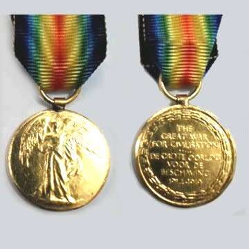 First World War Miniature Victory Medal with Ribbon - Bilingual - Very Scarce.