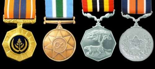 Grouping of 4 Full Size Medals with Ribbons: Pro Patria, Unitas, Southern Africa and General Service