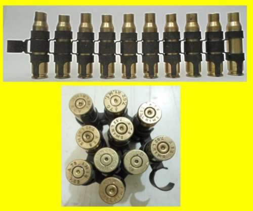 S.A.D.F. 7.62mm. Machine Gun Belt with 10 Shell Casings.