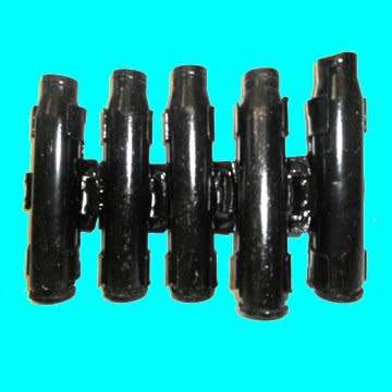 A Piece of Machine Gun Belt with Five 20 mm. Shell Casings.