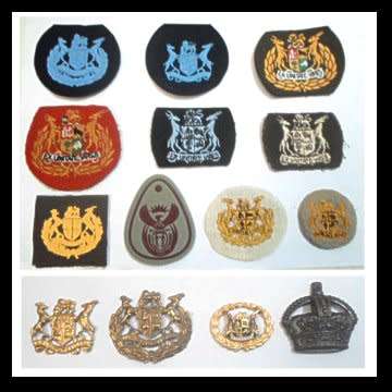 A Collection of 14 Sargent Major Badges from 2nd. W.W. to the Present.