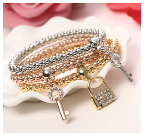 Fancy 3piece Yellow/Rose Gold and Silver Tone Bracelet with Crystal Charms