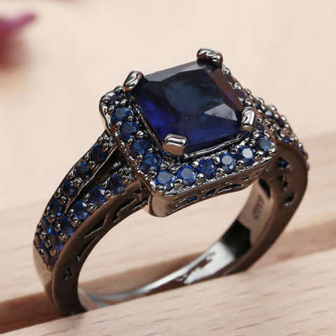 Super-B Cr. Blue Sapphire Set in 14k Black Gold Imported Filled Ring