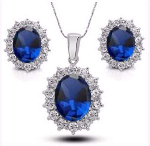 Attractive Sim Sapphire Surrounded By White Diamond Pendant with Free Matching Earrings.