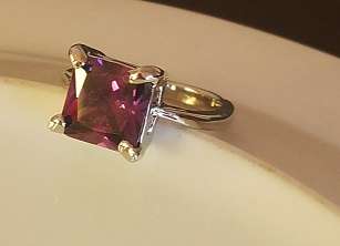 PURPLE CZ SET IN .925 STERLING SILVER RING