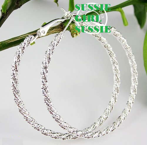 SEXY AND SASSY 925 STERLING SILVER COATED GLITTER DUST TWISTED  EARRINGS