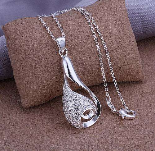 GLAMOR IS BACK WITH THIS CLASSIC PEAR-CUT DIAMOND SIMULATED PENDANT