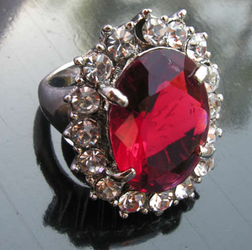 Magnificent 18KGP Dress Ring with Huge Oval Red Stone.