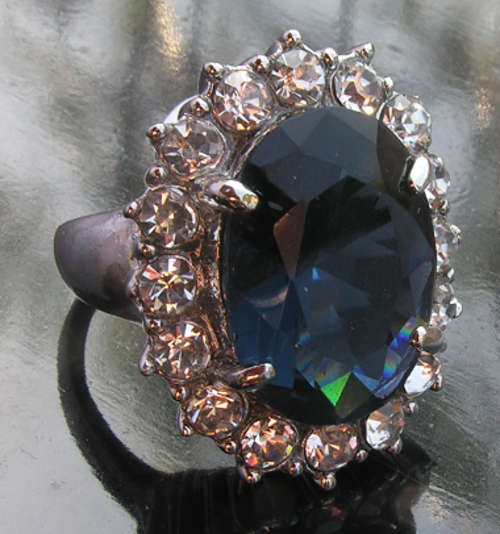 Glamourous 18KGP Dress Ring with Huge Oval Blue Stone.