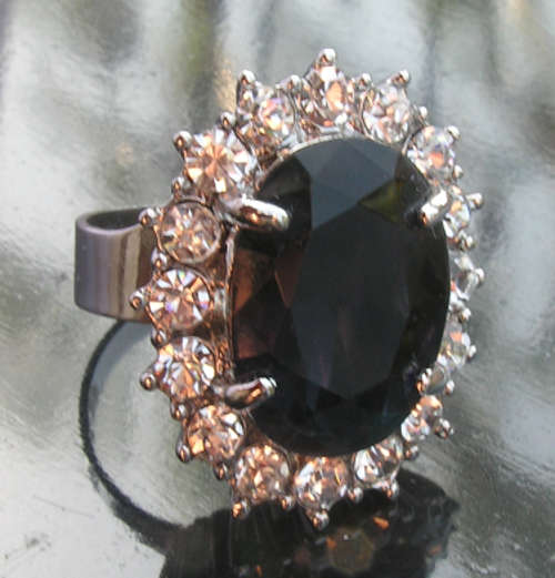 Glamourous 18KGP Dress Ring with Huge Oval Blue Stone.