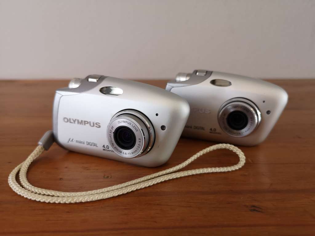 Two Olympus mju-mini digital compact cameras