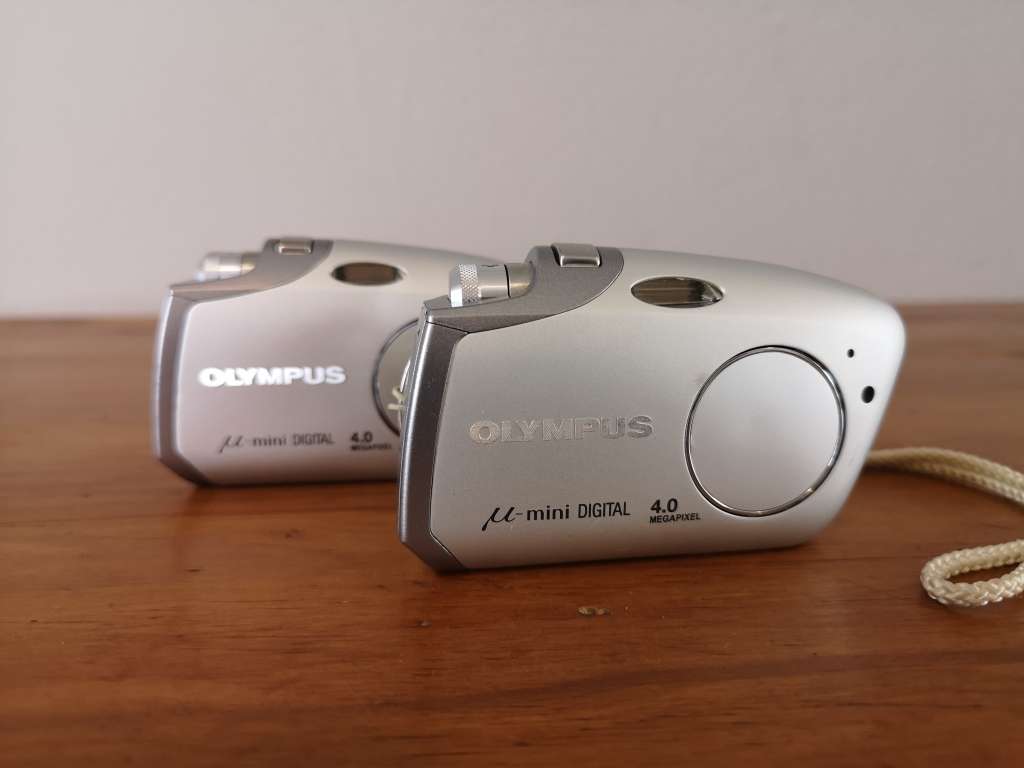 Two Olympus mju-mini digital compact cameras