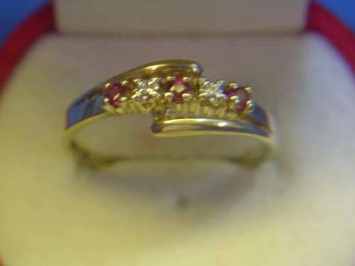 9ct Gold Ruby's and Diamond's ring