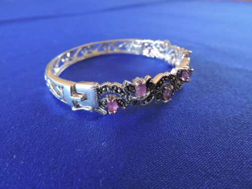 RUBY and SILVER HINGED BANGLE WITH 9 NATURAL RUBIES AND MARCASITE