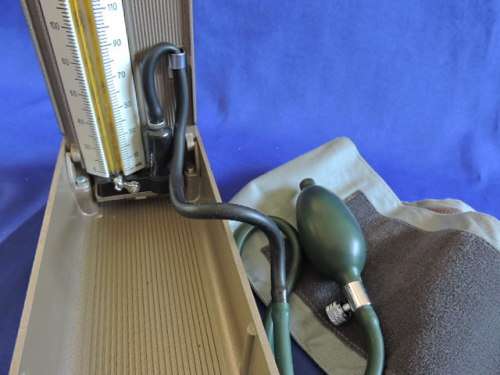 Vintage sphygmomanometer blood pressure medical measuring instrument