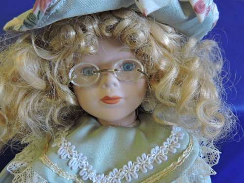 Vintage Porcelain Doll (with specticles)