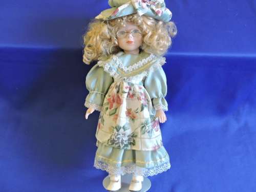 Vintage Porcelain Doll (with specticles)