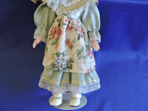 Vintage Porcelain Doll (with specticles)