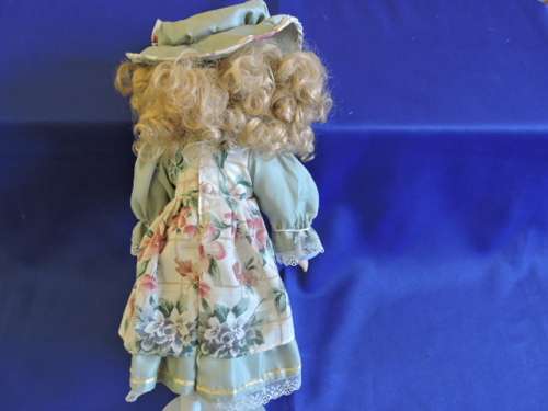 Vintage Porcelain Doll (with specticles)